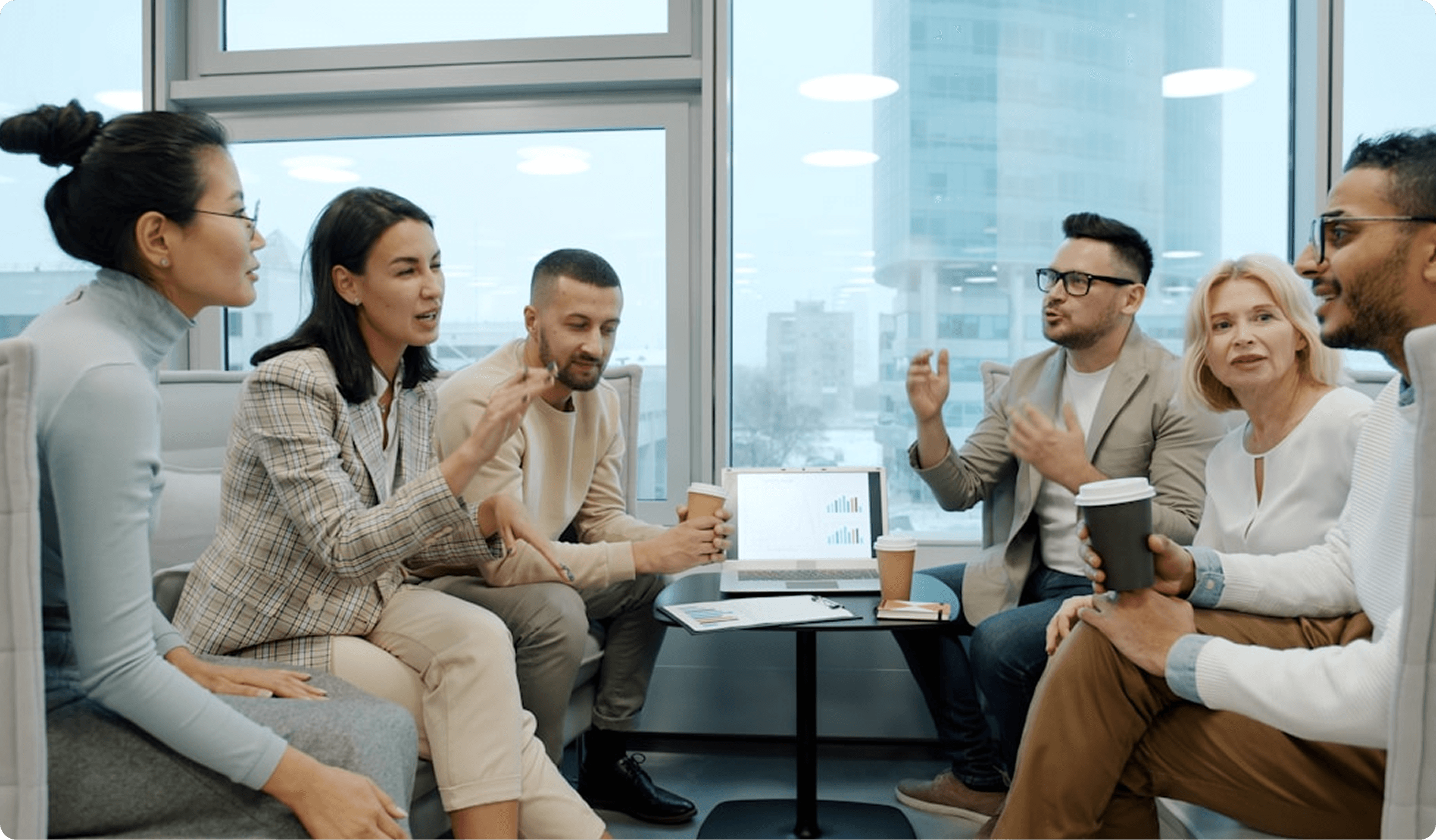 Business professionals collaborating during an advisory meeting